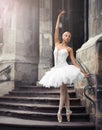 Beautiful ballet woman on stairs