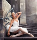 Beautiful ballet woman on stairs