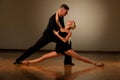 Beautiful ballroom couple preforming their pasonate exhibition d Royalty Free Stock Photo