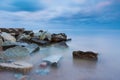 Beautiful Baltic sea landscape with stone breakwater. Tranquil long exposure landscape