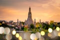 Beautiful Bangkok iconic landmark Wat Arun at dusk with beautiful foreground bokeh lights