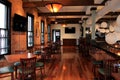 Beautiful bar, with warm wood and brick, welcomes patrons in for a visit,Harvey's Resaurant and Bar,Saratoga,New York,2015