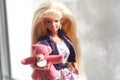 A beautiful barbie with white hair. Stylish doll. Royalty Free Stock Photo