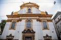 Beautiful Baroque Church of the Holy Trinity at Spalena street in the center of Prague during the autumn day, Czech Republic,