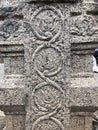 Beautiful bas relief designs in the carved walls at Shiva temple in Tamil nadu. Bas relief rock cut decoration in walls Royalty Free Stock Photo