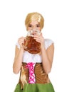 Beautiful bavarian woman drinking beer.