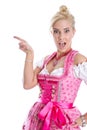 Beautiful bavarian woman isolated making promotion for Oktoberfest in munich.