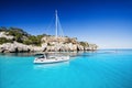 Beautiful bay with sailing boats, Menorca island, Spain Royalty Free Stock Photo