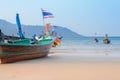 Beautiful beach against seaview with fishing boats dock at kata beach, Phuket, Thailand Royalty Free Stock Photo