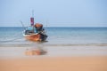 Beautiful beach against seaview with fishing boats dock at kata beach, Phuket, Thailand Royalty Free Stock Photo