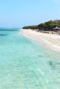 Beautiful beach with blue clean water and cafe Royalty Free Stock Photo