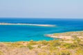 Beautiful beach of Crete with turquoise water. A popular tourist beach. Kolokitha beach. Royalty Free Stock Photo