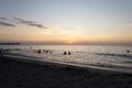 Beautiful beach dusk landscape with tourist silhouette Royalty Free Stock Photo