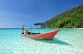 Beautiful beach with motor boat Royalty Free Stock Photo