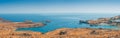 Beautiful beach panorama and the historic city of Lindos. Royalty Free Stock Photo