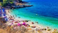 Beautiful Beach with people on the sand enjoing water and sun Royalty Free Stock Photo