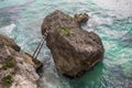 Beautiful beach of stones with stairs at fisherman town, Dalmatia, Croatia. Island Solta with crystal clean water, south Royalty Free Stock Photo