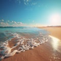 A beautiful beach with the sun shining and the waves lapping the sand Royalty Free Stock Photo