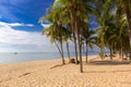 Beautiful beach in Thailand. View of sunlight tropical sea beach with coconuts palms. Tropical sand beach holiday for background Royalty Free Stock Photo