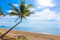 Beautiful beach in Thailand. View of sunlight tropical sea beach with coconuts palms. Tropical sand beach holiday for background Royalty Free Stock Photo