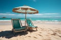 Beautiful beach. Two chairs, sun loungers and beach umbrella on the sandy beach against the backdrop of the sea. Royalty Free Stock Photo