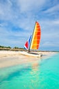 The beautiful beach of Varadero in Cuba with a colorful sailboat Royalty Free Stock Photo
