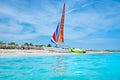The beautiful beach of Varadero in Cuba with a colorful sailboat Royalty Free Stock Photo