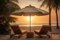 Beautiful Beach View with Gazebo and Lounge Chairs Relaxing Vacation Place at Sunset Royalty Free Stock Photo