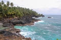 Beautiful beach with volcanic rocks and clear water in Sao Tome and Principe Island, in Africa