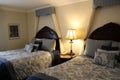 Beautiful bedroom inside one of Niagara Fall`s hotels rumored to be haunted, Red Coach Inn, New York, 2018.