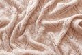 Beautiful beige abstract knitted fabric background, texture