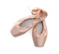 Beautiful beige ballet shoes isolated on white, top view