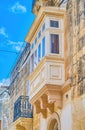 The typical Maltese balcony in Mosta