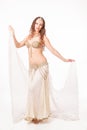 Beautiful belly dancer holding veil