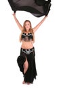 Beautiful belly dancer posing with a veil Royalty Free Stock Photo