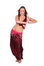 Beautiful belly dancer in red costume Royalty Free Stock Photo
