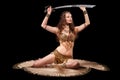Beautiful belly dancer with sword Royalty Free Stock Photo