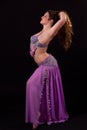 Beautiful bellydancer holding her hair