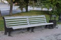 A beautiful bench in autumn park