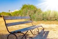 beautiful bench near the sea shore on nature background