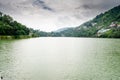 Beautiful Bhimtal Lake is a lake in the town of Bhimtal, in the Indian state of Uttarakhand. Green water lake Royalty Free Stock Photo