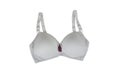 Beautiful big breasts in bra. Plus size bra on white background Royalty Free Stock Photo