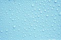 Abstract water droplets on the blue background. Royalty Free Stock Photo