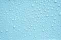 Abstract water droplets on the blue background.