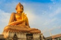 Beautiful big golden Buddha statue on the hilltop at Wat Khao Ba Royalty Free Stock Photo