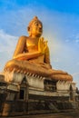 Beautiful big golden Buddha statue on the hilltop at Wat Khao Ba Royalty Free Stock Photo