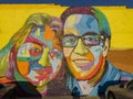 Beautiful big Graffiti art of colorful man and woman