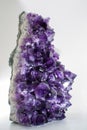 Beautiful big purple bright gemstone amethyst crystal isolated c