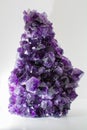 Beautiful big purple bright gemstone amethyst crystal isolated c