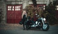 Beautiful biker woman with motorcycle.